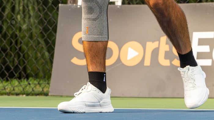 Close up shot of white pickleball shoes