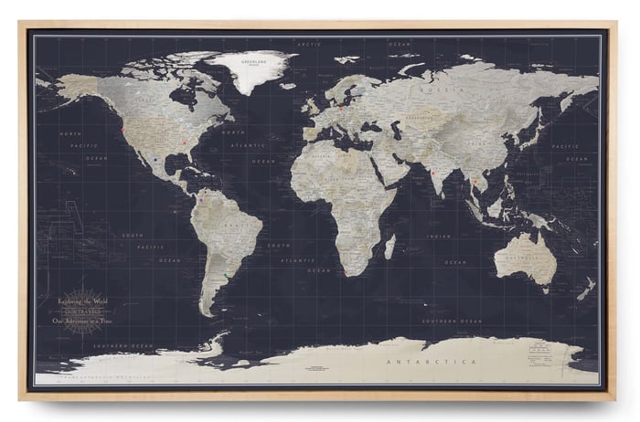 dark color push pin canvas world map in light color frame