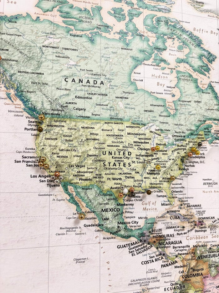 Push pin map used as alternative to wedding guest book