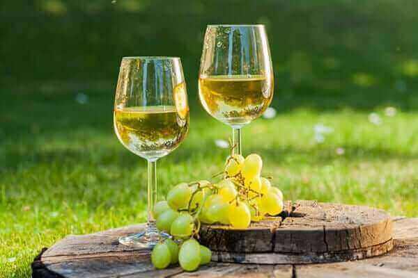 Bacchus wine in the glass