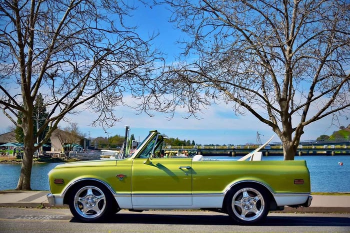 Side profile of the 1972 K5 Blazer highlighting its low, aggressive stance and classic green paint