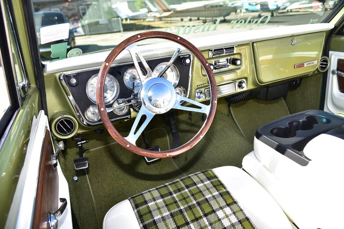 Dashboard detail showing factory-style gauges and restored trim.