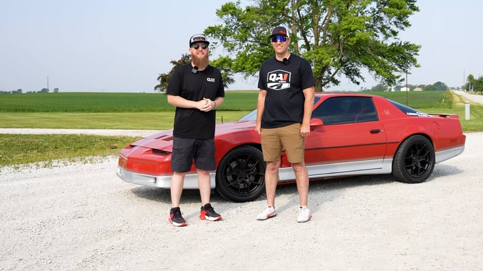 Eric from EssMotorsports in front of his red third gen trans am