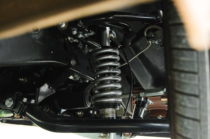 ront QA1 tubular crossmember and coilovers installed on stock chassis.