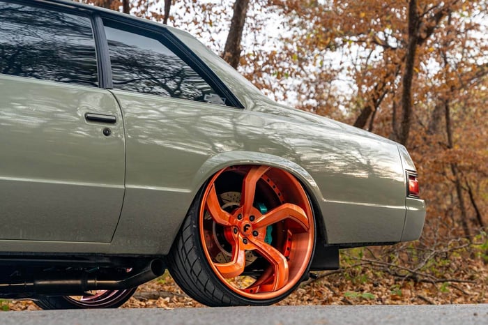 A shot of the 24-inch Forgiato wheels used for Big Rim Racing, emphasizing the car’s versatility.
