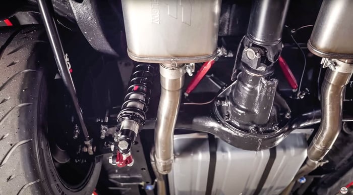 Rear suspension shot showing QA1 four-link and coilovers.