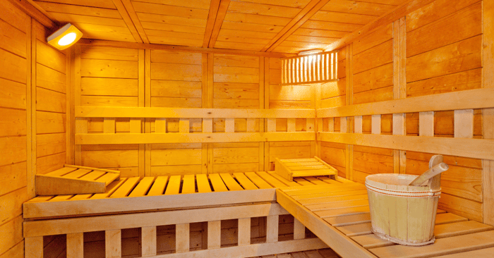 2 person sauna lighted and looking yellow