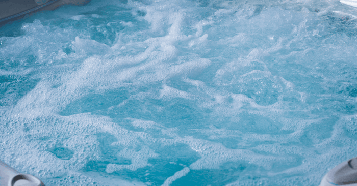 hot tub spa water looking blue and bubbly