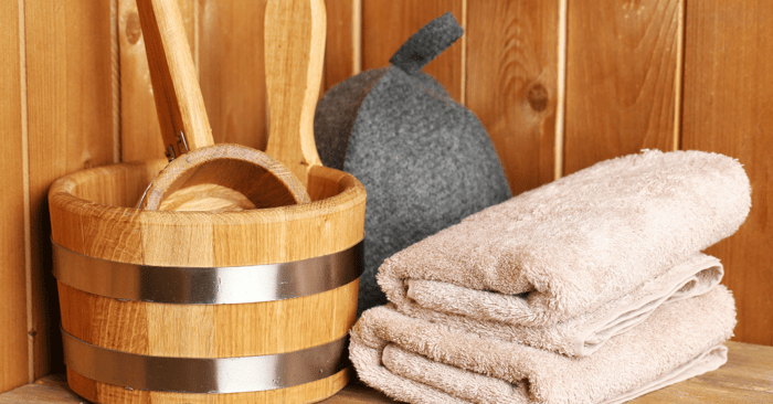 sauna kit with bucket and towels looking aesthetic