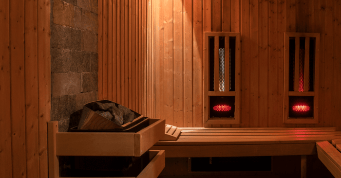 small sauna lighted and looking cozy