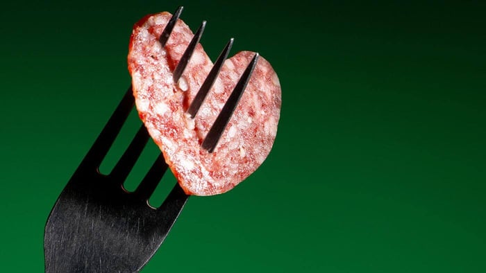 Heart-Shaped slice of Salami on a fork