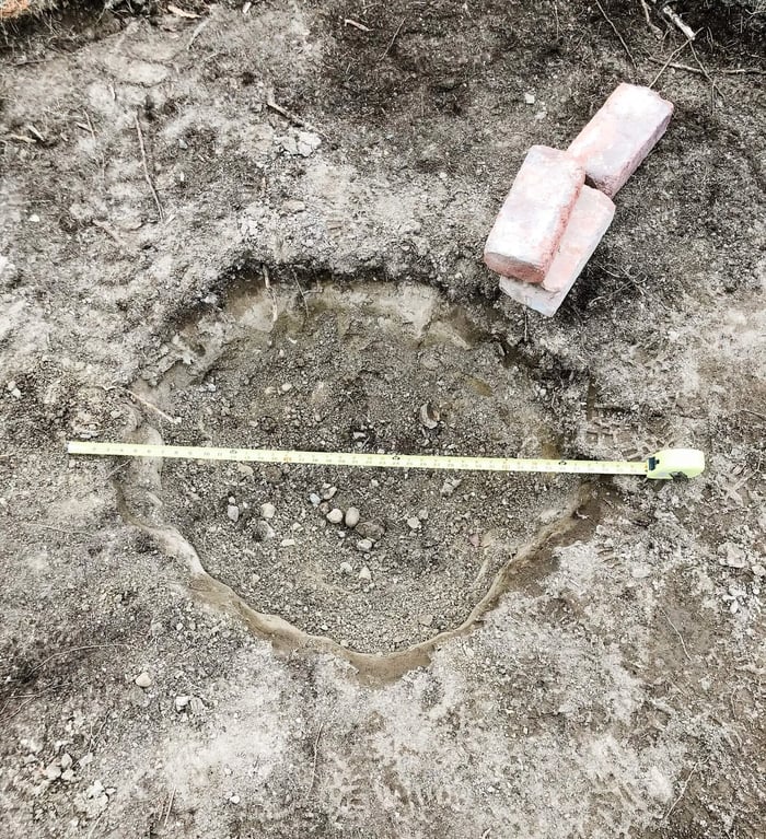 measuring land to build 48 inch fire pit 