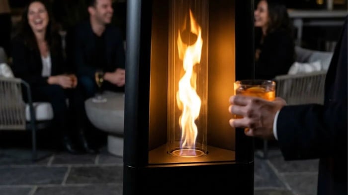 close up of outdoor pyramid heater in a restaurant patio setting 