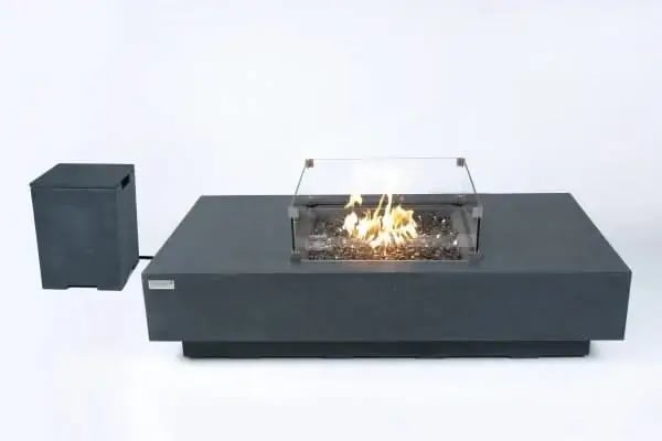 A dark grey rectangular fire pit table with a glass wind guard and a separate dark grey tank cover on a white background.