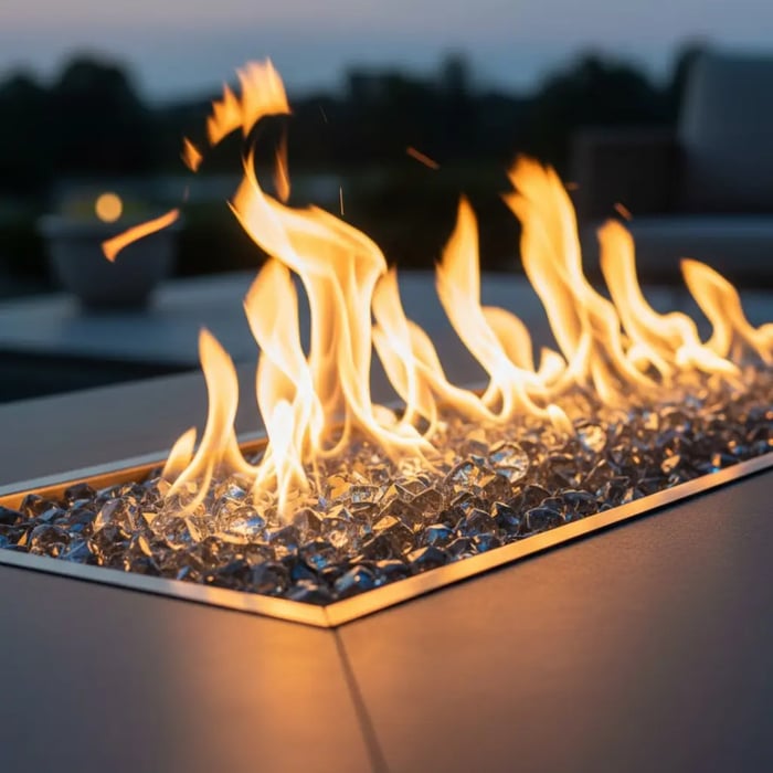 fire pit glass with golden flame burning