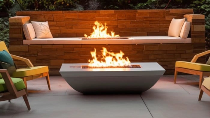 An elegant outdoor patio at dusk featuring a modern fire pit table as the centerpiece, surrounded by stylish seating and ambient lighting, showcasing its aesthetic appeal and how it elevates the home's curb appeal