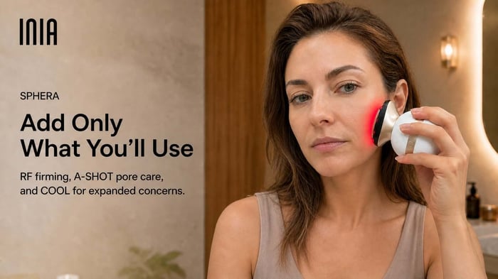 Woman using INIA SPHERA on her cheek, with guidance to add RF firming, A-SHOT pore care, and COOL only when she will use them