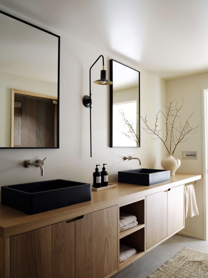 Photo of bathroom with two sinks. Interior design by Grayhaus | Photo by Luke and Mallory Leasure