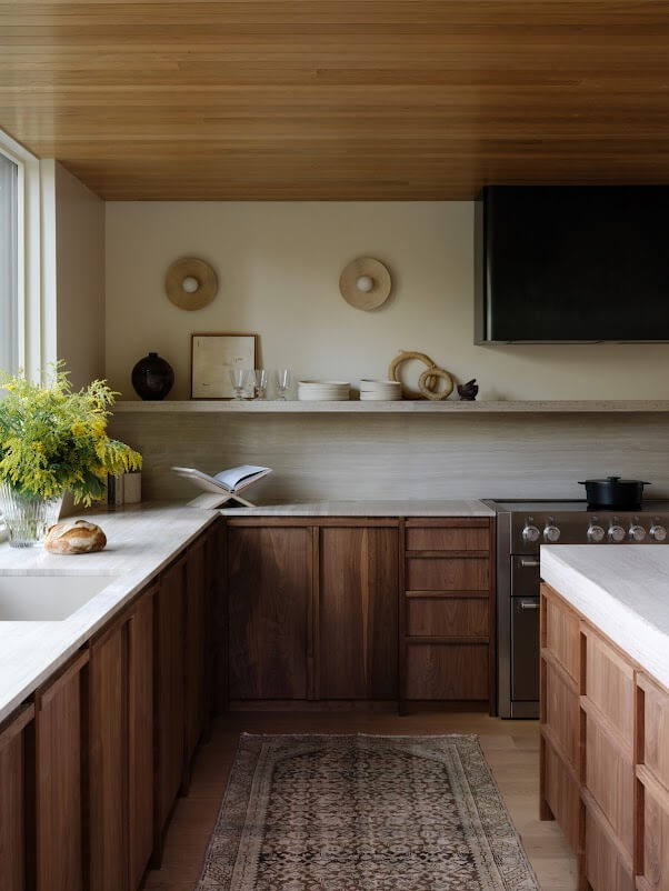 Photo of kitchen with vintage rug. Interior design by Grayhaus | Photo by Luke and Mallory Leasure