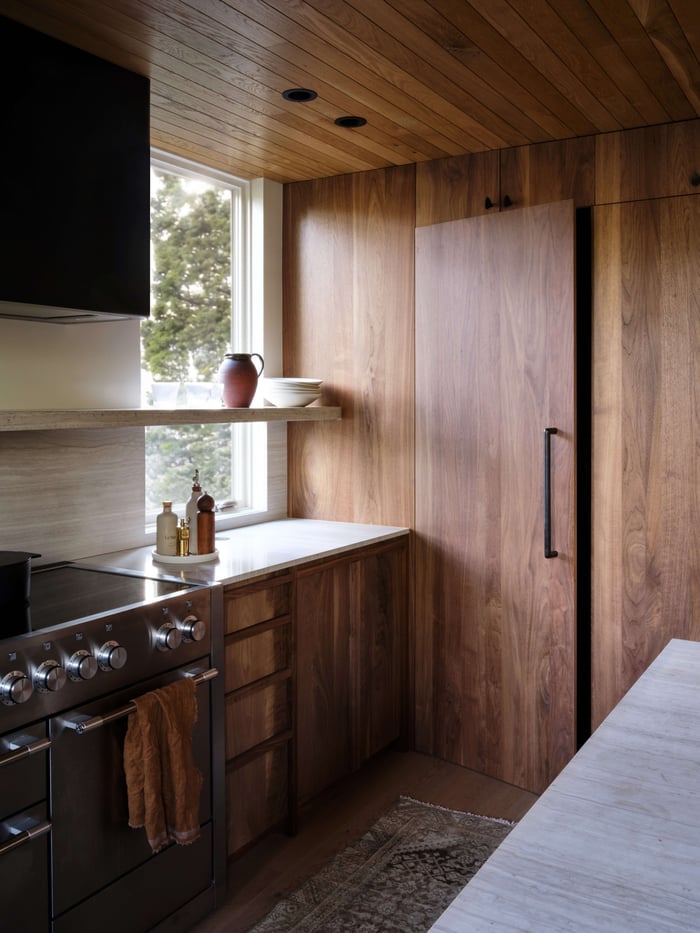 Photo of kitchen with vintage rug. Interior design by Grayhaus | Photo by Luke and Mallory Leasure