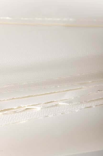 A close-up of a white paperAI-generated content may be incorrect.