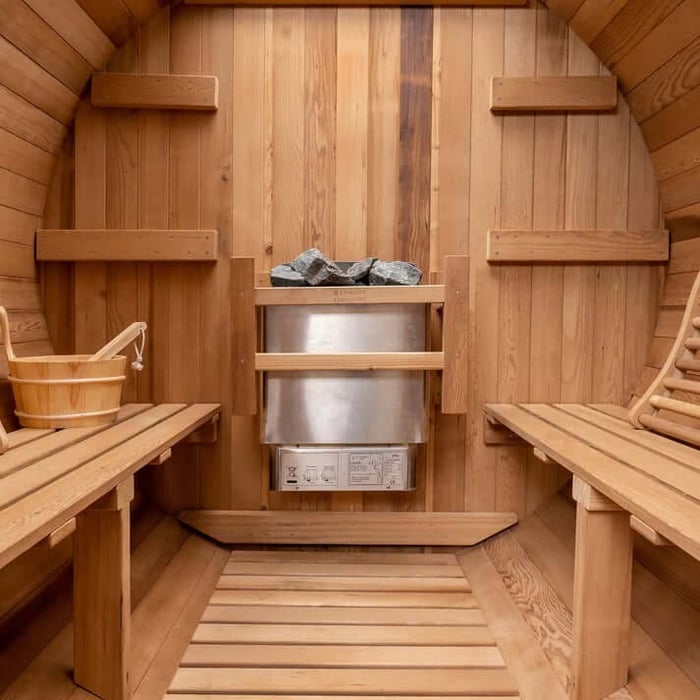 Inside barrel sauna lie down