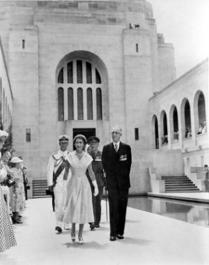 Queen Elizabeth II being accompanied by Charles Bean during a tour of the AWM