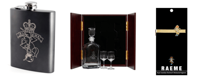A bottle and glasses in a boxDescription automatically generated