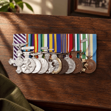 Set of mounted medals laid on desk