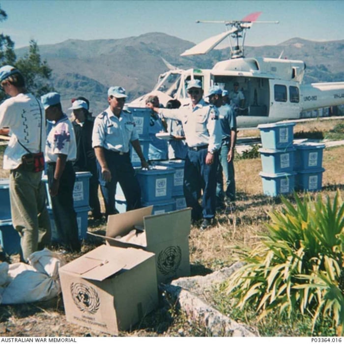 Australian Federal Police officers oversee safe transport of ballot boxes following the referendum to allow the East Timorese to choose between autonomy within Indonesia or independence, August 1999.