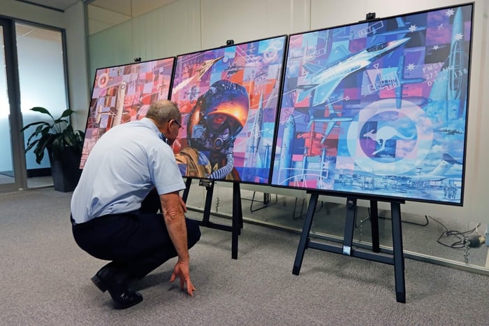 Chief of Air Force Mel Hupfeld inspects the Air Force Centenary Artwork print