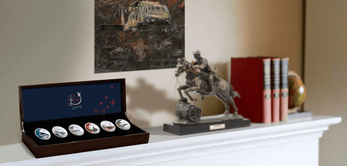 A statue of a person riding a horse and a box of watches  Description automatically generated
