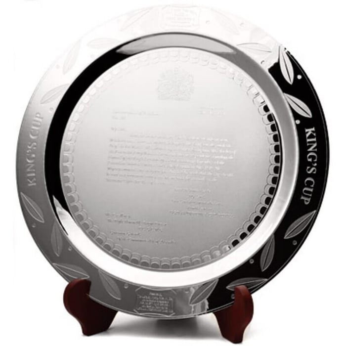 A silver plate with a black border  Description automatically generated