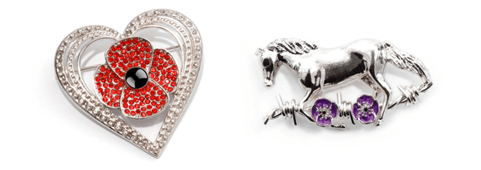 A close up of a brooch  Description automatically generated
