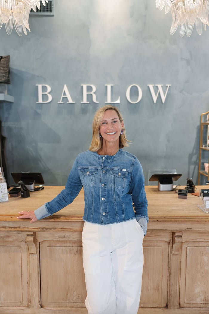 Susan Charlet, owner, standing in front of Barlow Fashion in St. Francisville