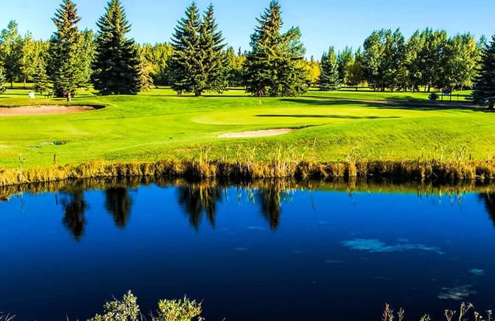 pretty blue-black lake on golf course
