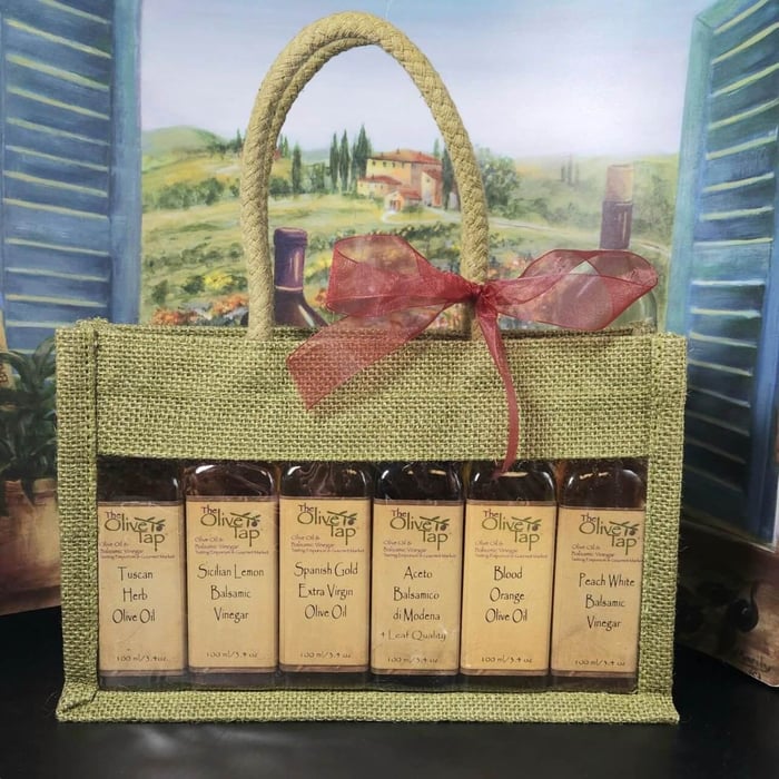 6 Bottles of Oil and Vinegar in a Burlap Bag