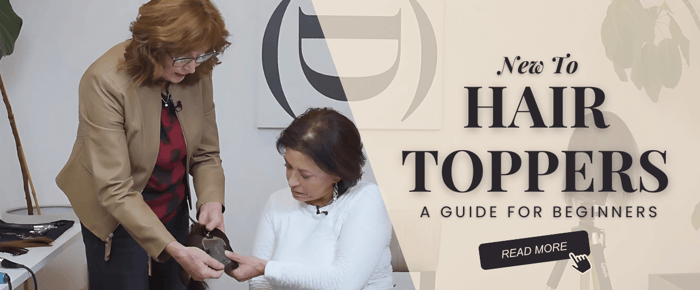 A hair stylist shows a client how to use a hair topper.