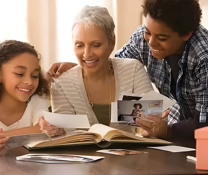 a family looking at a photo album