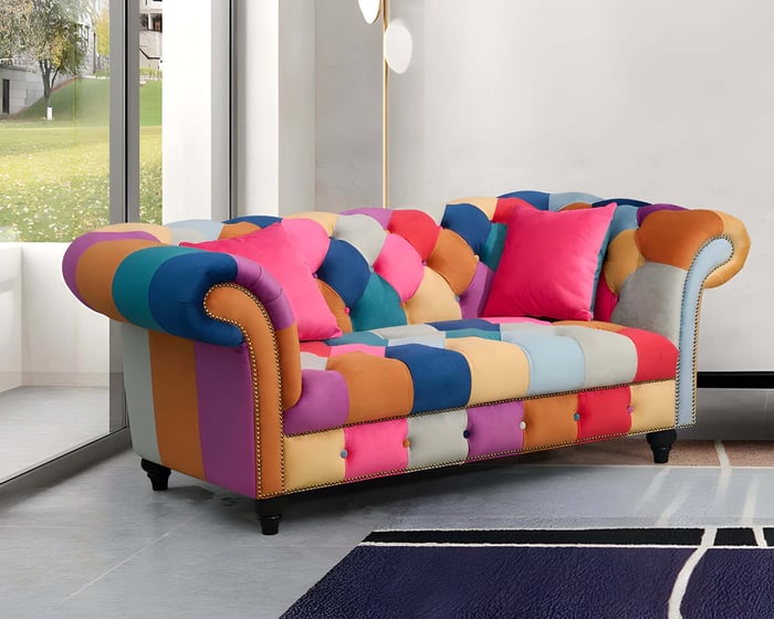A multicoloured sofa in a living room