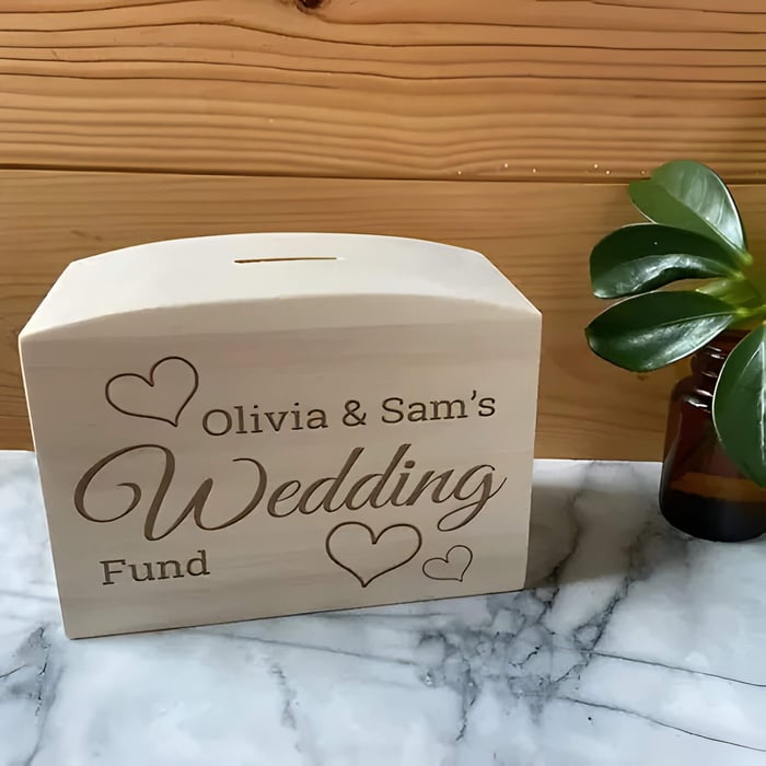 a wooden wedding fund box