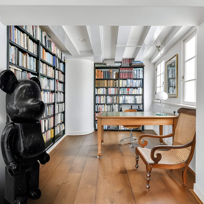 A large black stone giant bear in a traditional library
