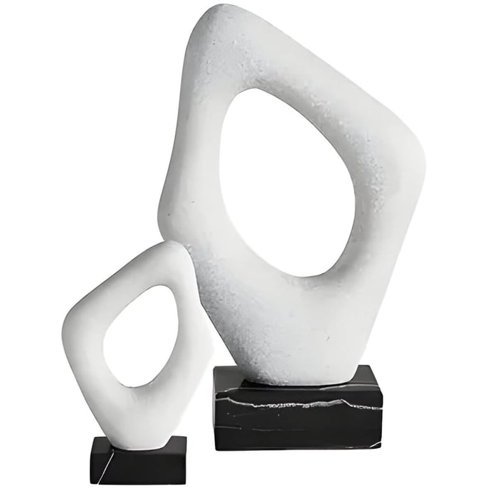 2 white and black stone sculptures