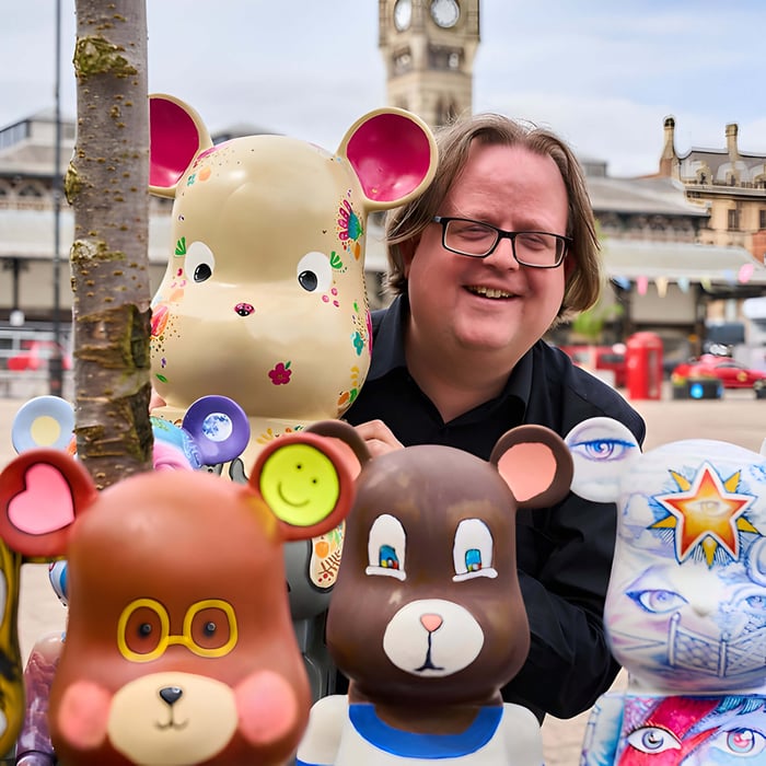 A man stood amongst the bears on Darlington bear trail
