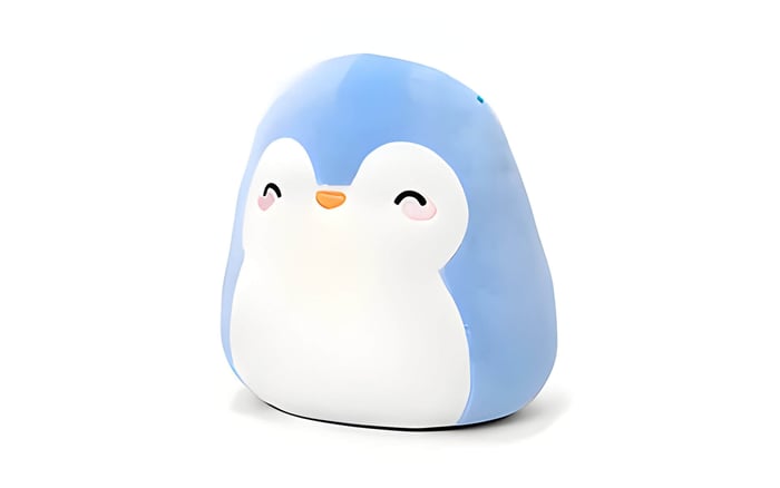 a squishmallow, shaped like a penguin blue and white