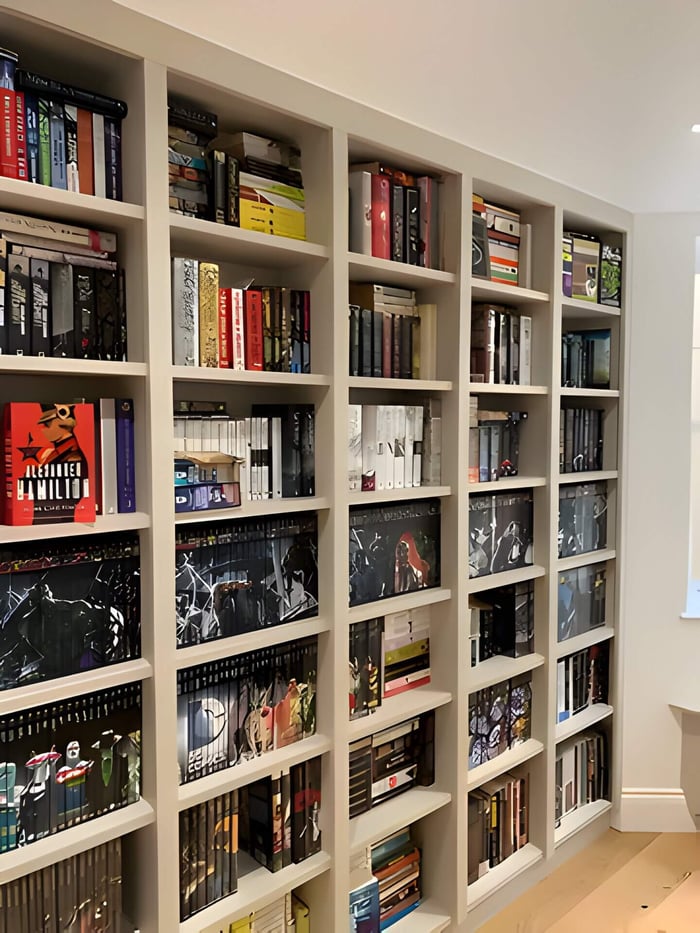 floor to ceiling bookcase in a small room
