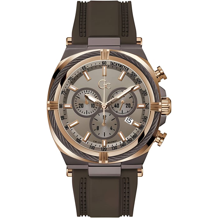 a brown strapped watch with a gold display