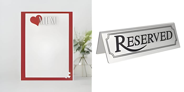 a cream and red valentines menu & a reserved table sign