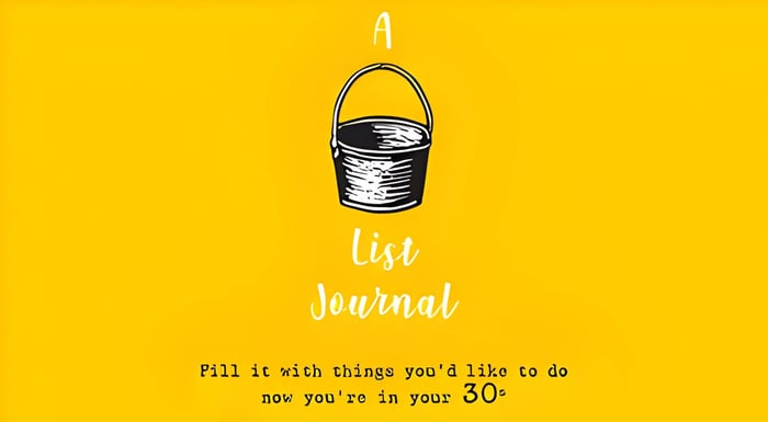 the front cover of a journal with a yellow background and a grey bucket