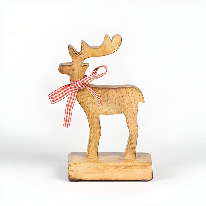 a wooden reindeer sculpture with a red and white check bow